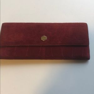 Lodi’s red suede wallet